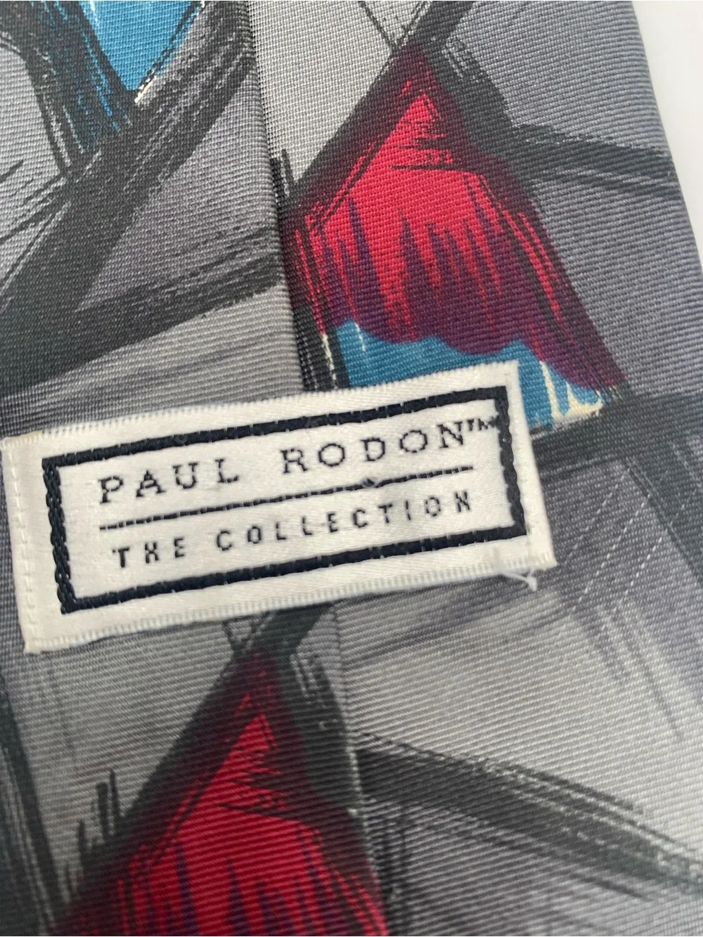 Gray Men's Tie with Red and Blue Abstract Accents